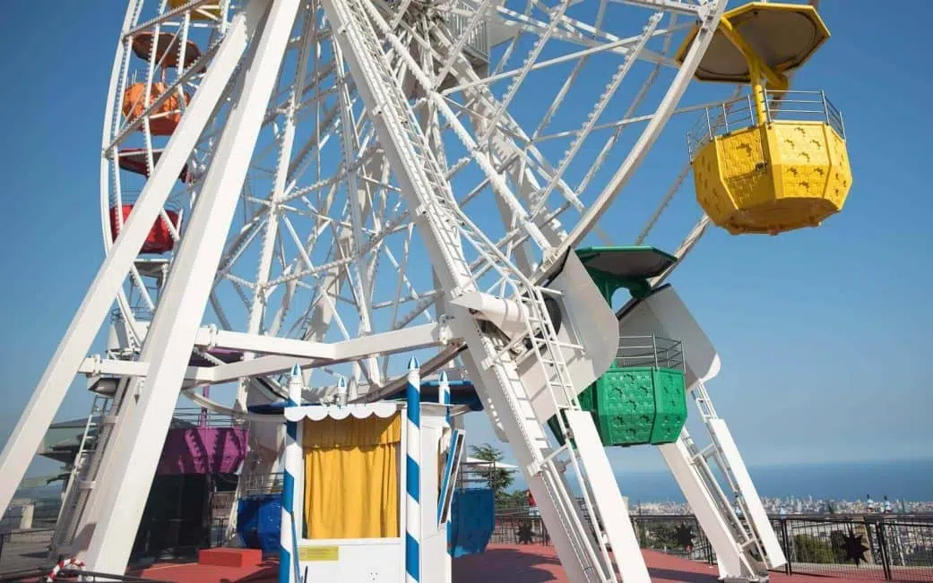 a ferris wheel atop tibidabo amusement park barcelona