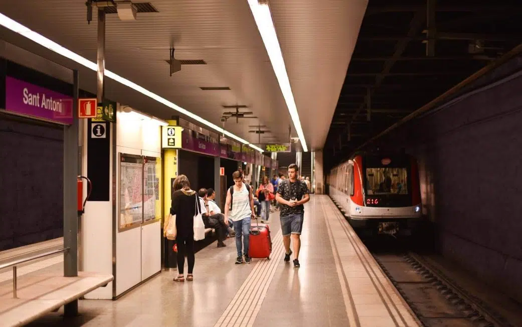 travellers use the metro in barcelona spain