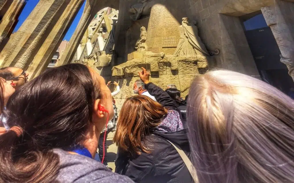 sagrada familia guided tour guide explains the passion façade