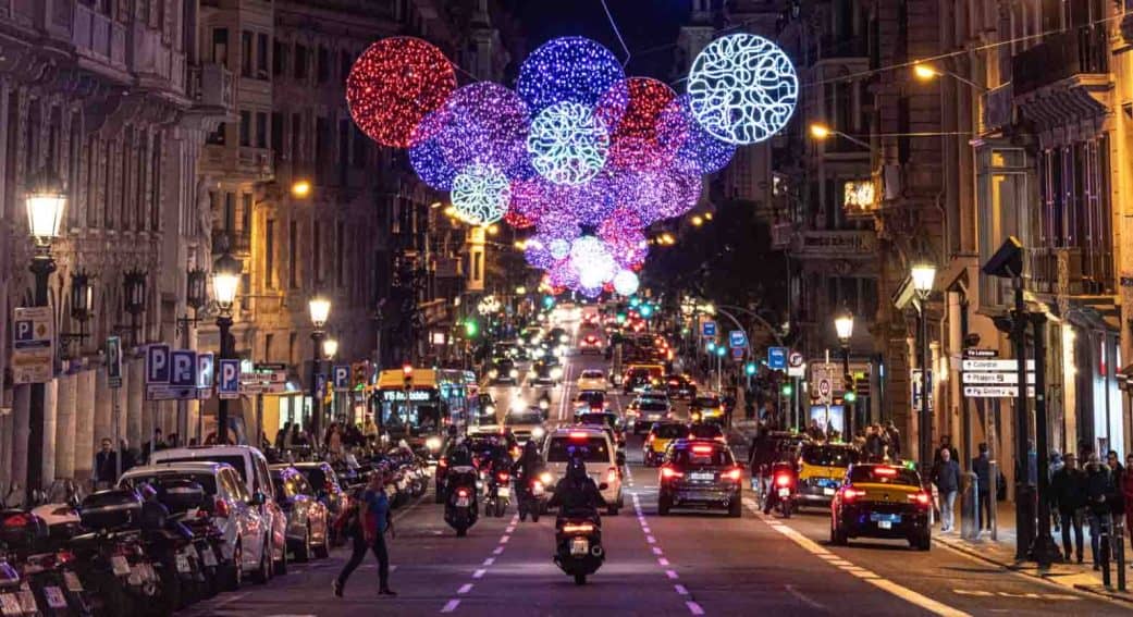 christmas lights illuminate a street in barcelona