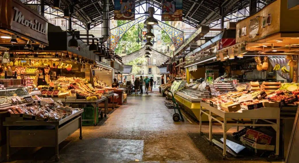 food stalls at la boqueria looking out into las ramblas barcelona