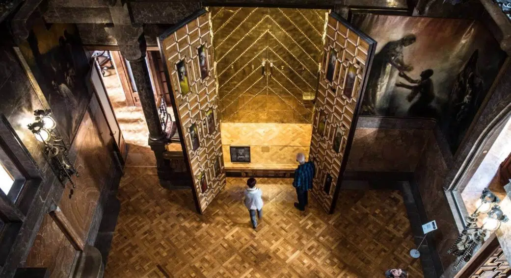 golden entranceway at the palau guell barcelona