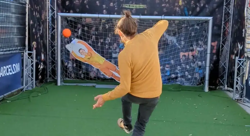 guest scoring a goal against the robokeeper on the camp nou tour in barcelona spain