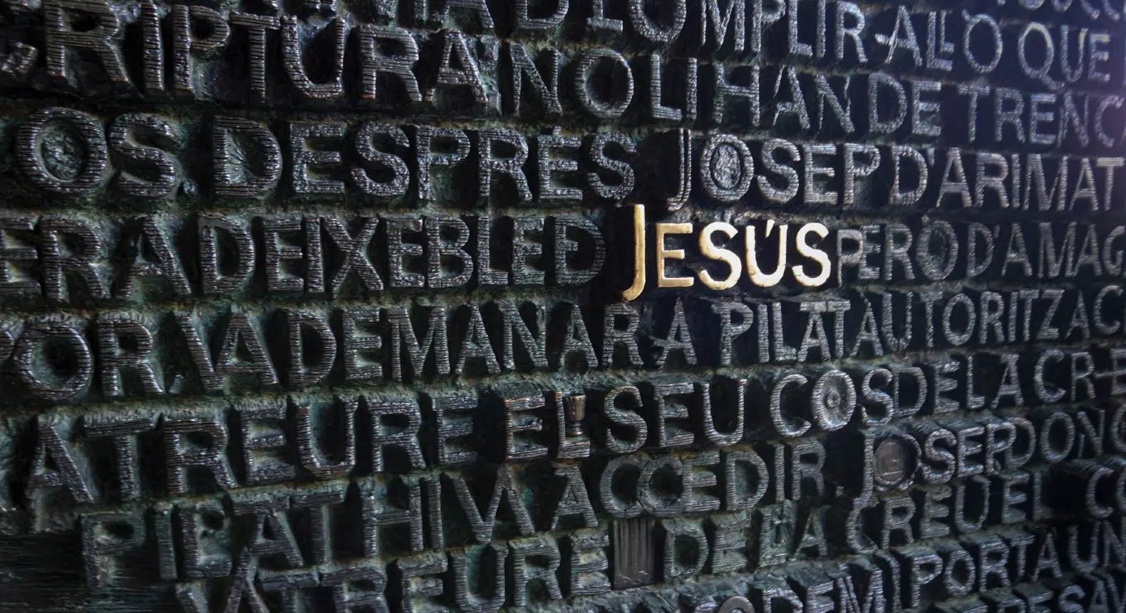 jesus inscription on the doors of the passion facade at sagrada familia dress code
