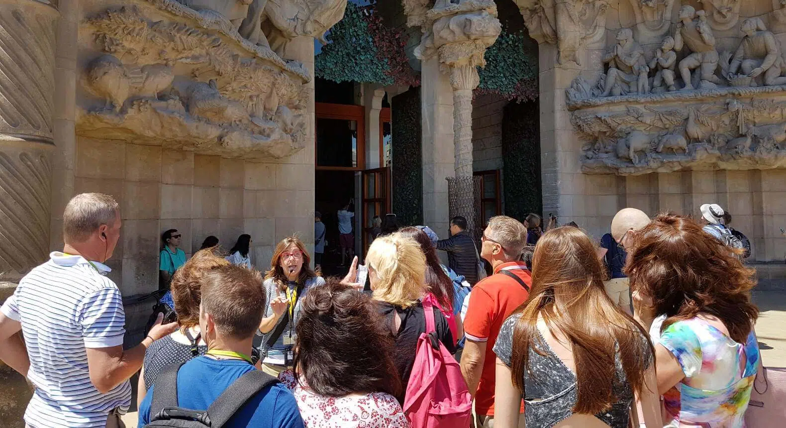 guests listening to a guide on the best guided tour of sagrada familia