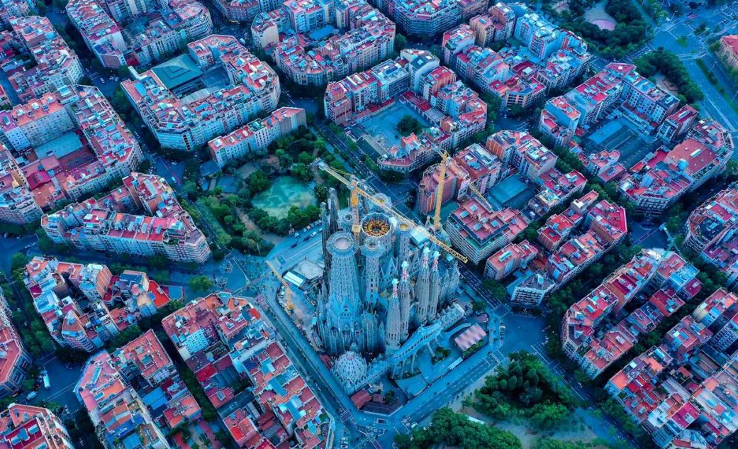 aerial with of sagrada familia with all the 18 towers