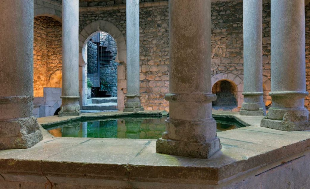stone walls and columns at the arab baths in girona spain