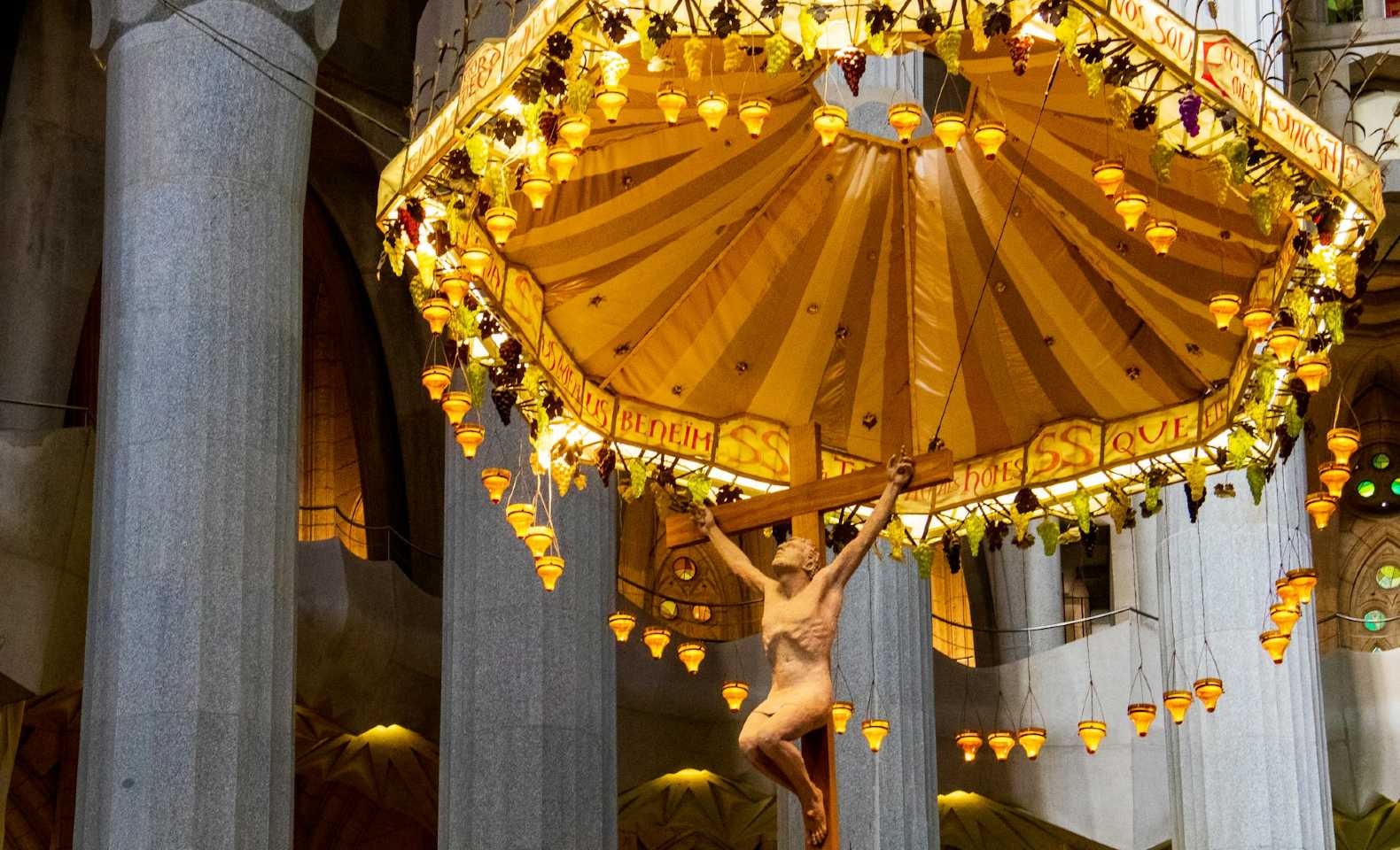 christ depiction hanging from the rafters at the sagrada familia in barcelona spain what is la sagrada familia made of